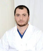 Врач Сусуркаев Асланбек Адланович
