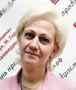 Врач Тумасова Марина Хугасовна