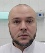 Врач Редковский Виталий Сергеевич