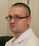 Врач Ревуненков Григорий Валериевич