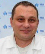 Врач Синицын Евгений Александрович