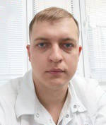 Врач Кадников Роман Васильевич