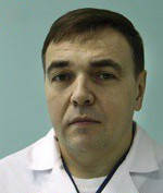 Врач Редченко Евгений Викторович